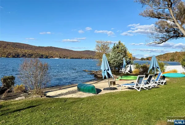 a view of a lake with a mountain