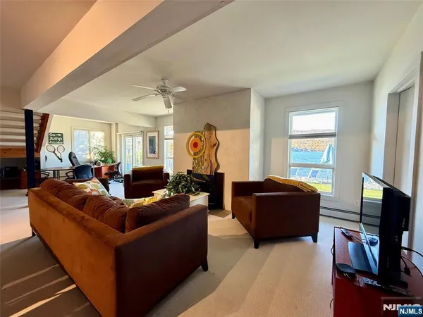 a bathroom with a sink a mirror and a bathtub