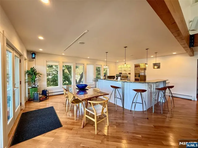 a view of a dining room with furniture window and outside view