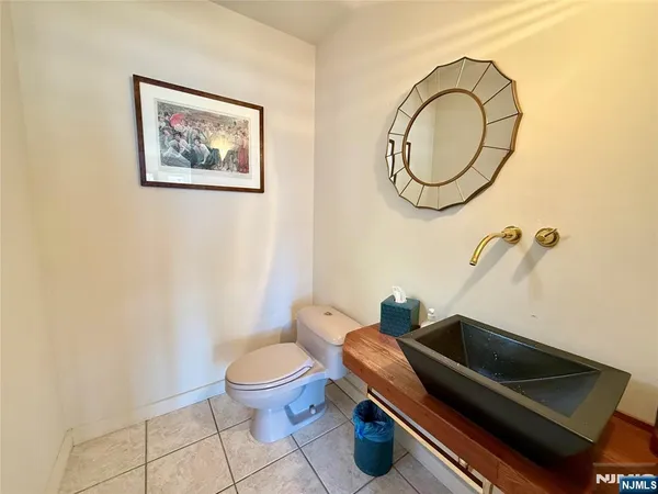 a bathroom with a toilet and a sink