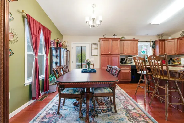 a view of a dining room with furniture