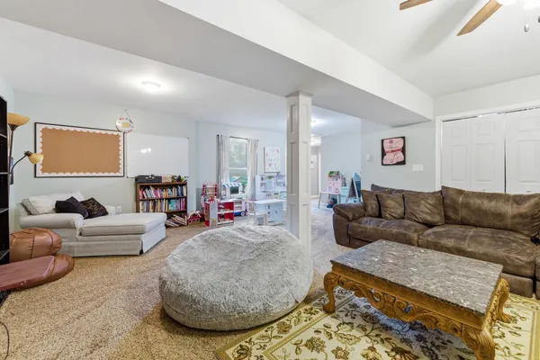 a living room with furniture and a couch