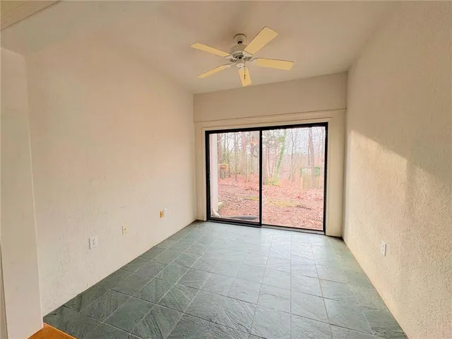 a kitchen with stainless steel appliances granite countertop a stove and a refrigerator