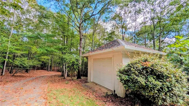 a view of a house with a tree