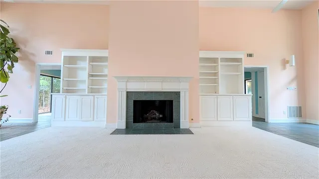 a view of a livingroom with a fireplace