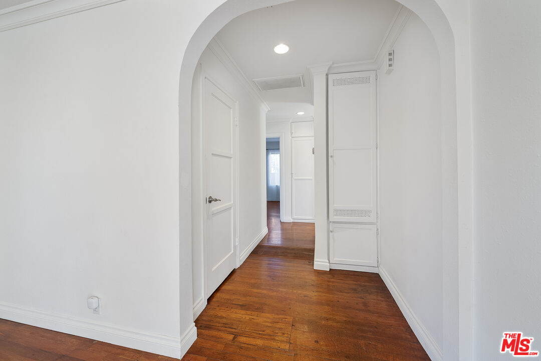 4516 Walnut Avenue Long Beach, CA 90807 - Photo 15 of 35 a view of a hallway with wooden floor