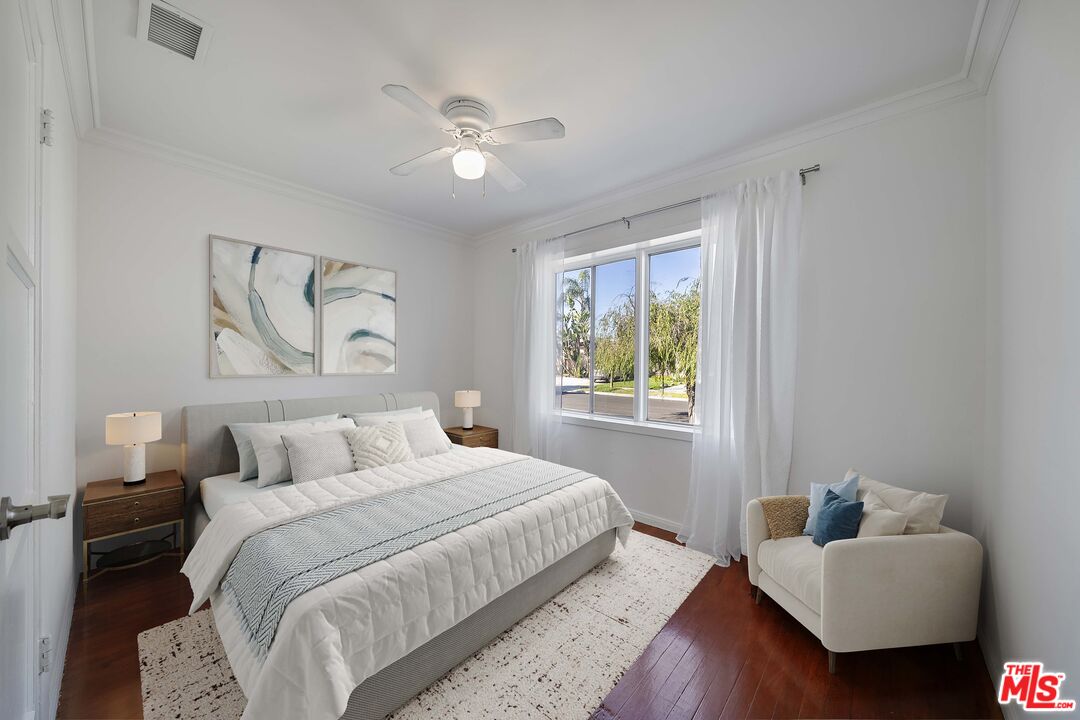 4516 Walnut Avenue Long Beach, CA 90807 - Photo 18 of 35 a bedroom with bed and a couch