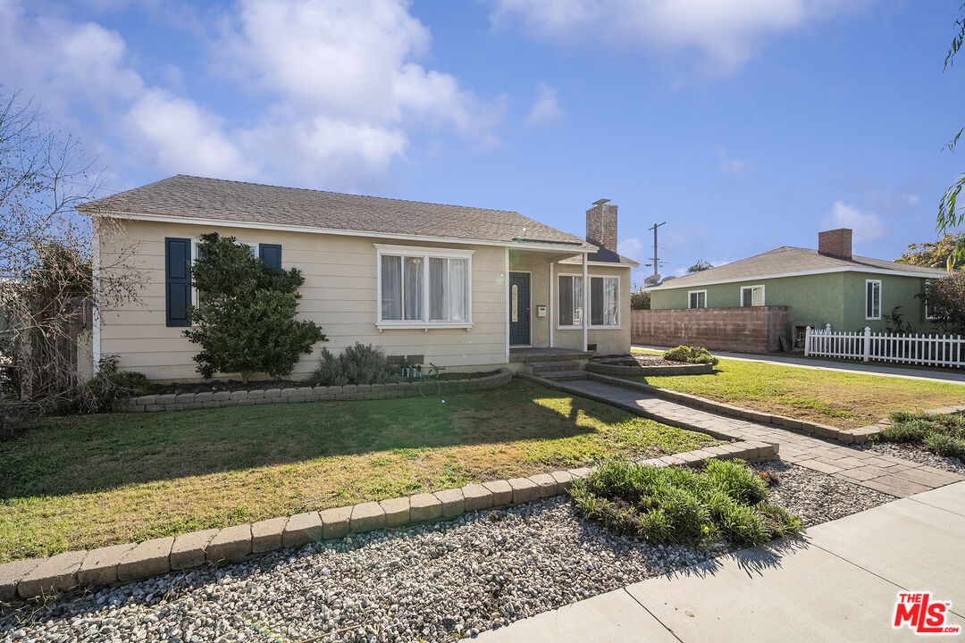 4516 Walnut Avenue Long Beach, CA 90807 - Photo 2 of 35 a view of a house with a swimming pool