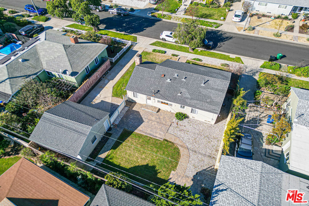 4516 Walnut Avenue Long Beach, CA 90807 - Photo 29 of 35 an aerial view of a house with a yard and a garden