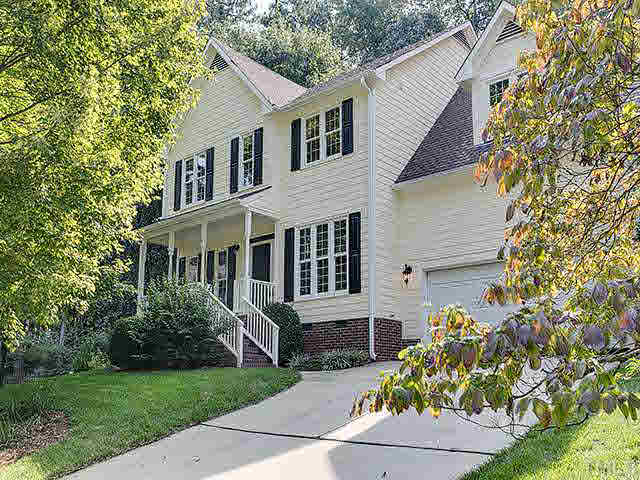 805 Bromley Way Raleigh, NC 27615 - Photo 1 of 25 a front view of a house with a garden