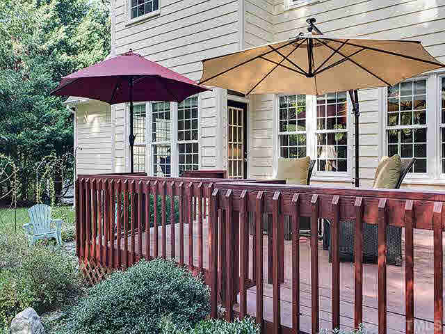 805 Bromley Way Raleigh, NC 27615 - Photo 17 of 25 a front view of a house with a garden