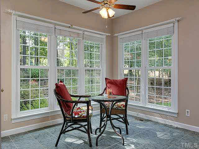 805 Bromley Way Raleigh, NC 27615 - Photo 8 of 25 a view of a dining room with furniture window and outside view