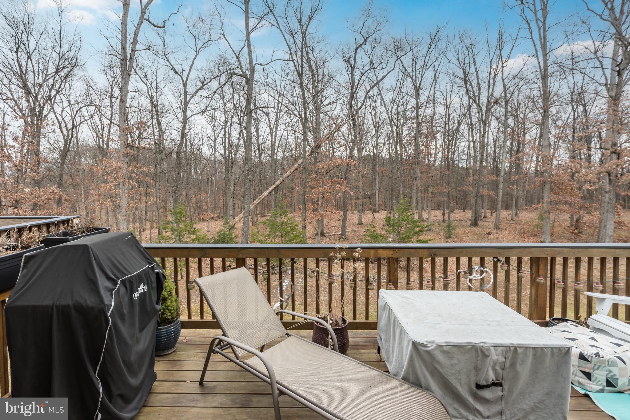 148 Solara Drive Winchester, VA 22602 - Photo 14 of 32 a view of a balcony with chairs