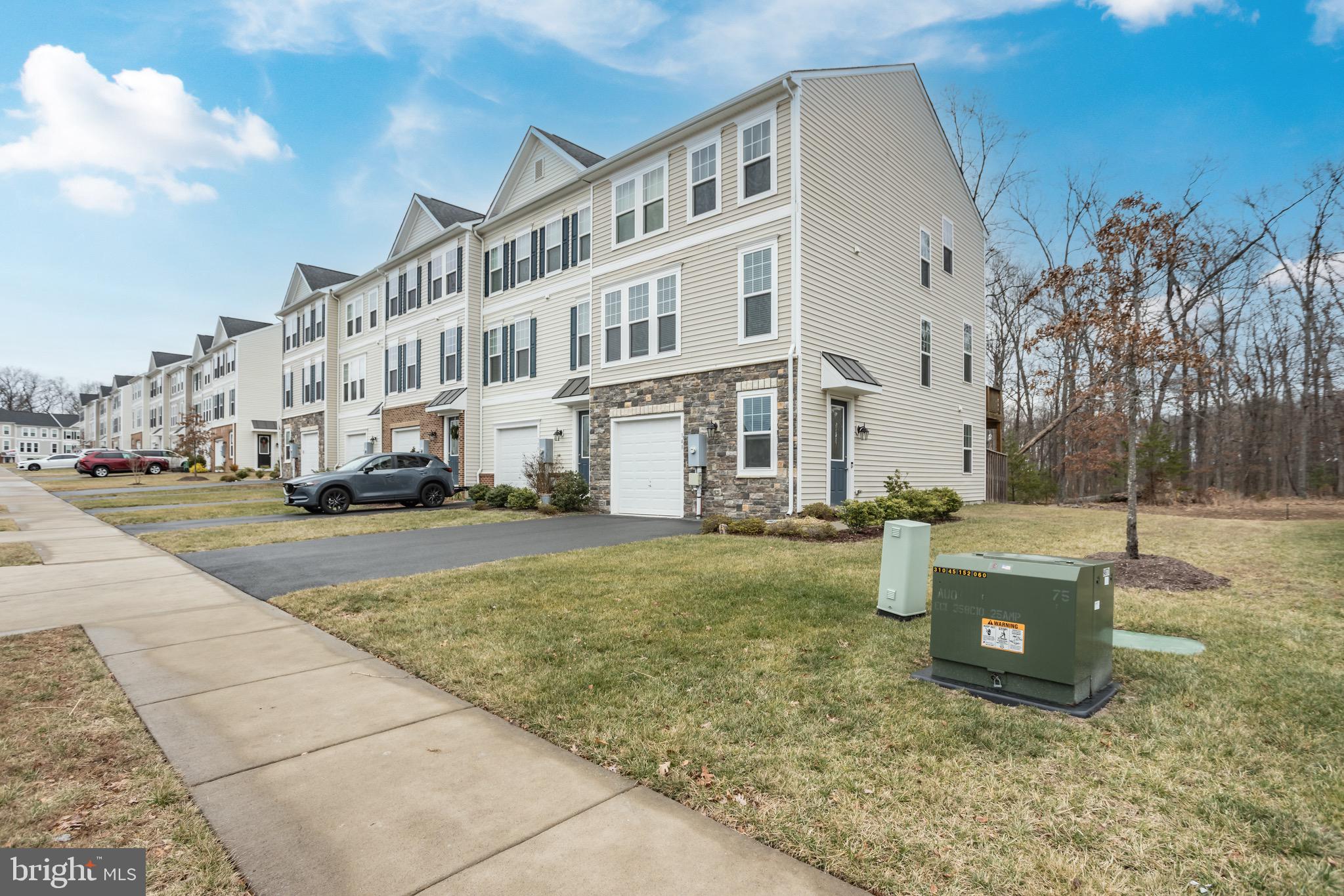 148 Solara Drive Winchester, VA 22602 - Photo 28 of 32 a building exterior with stairs and trees