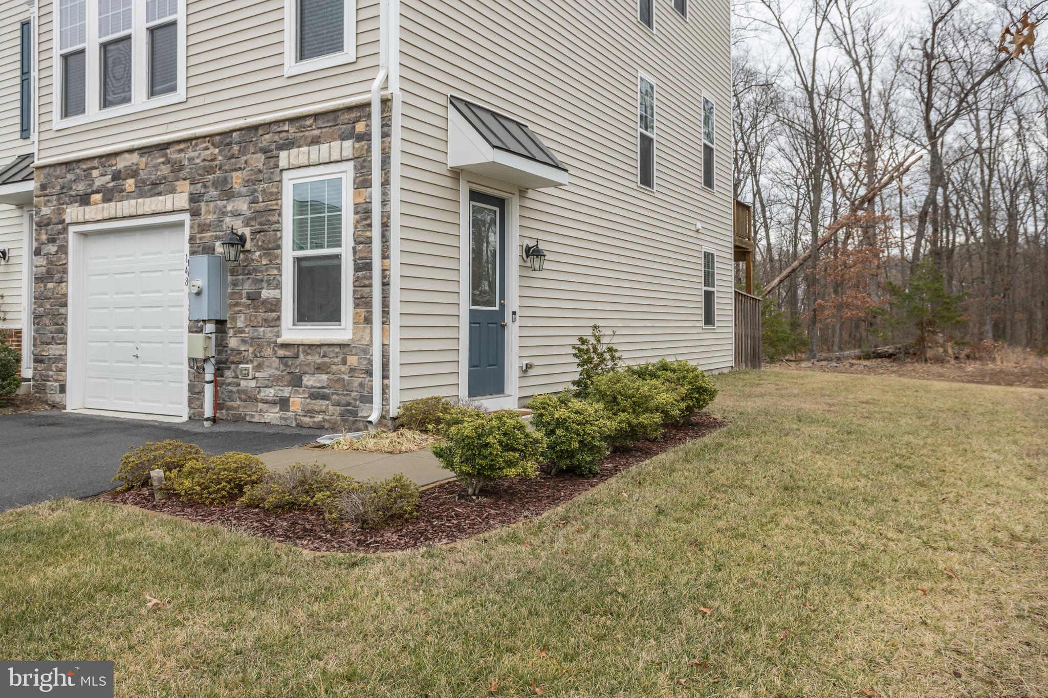 148 Solara Drive Winchester, VA 22602 - Photo 29 of 32 a view of a backyard of the house