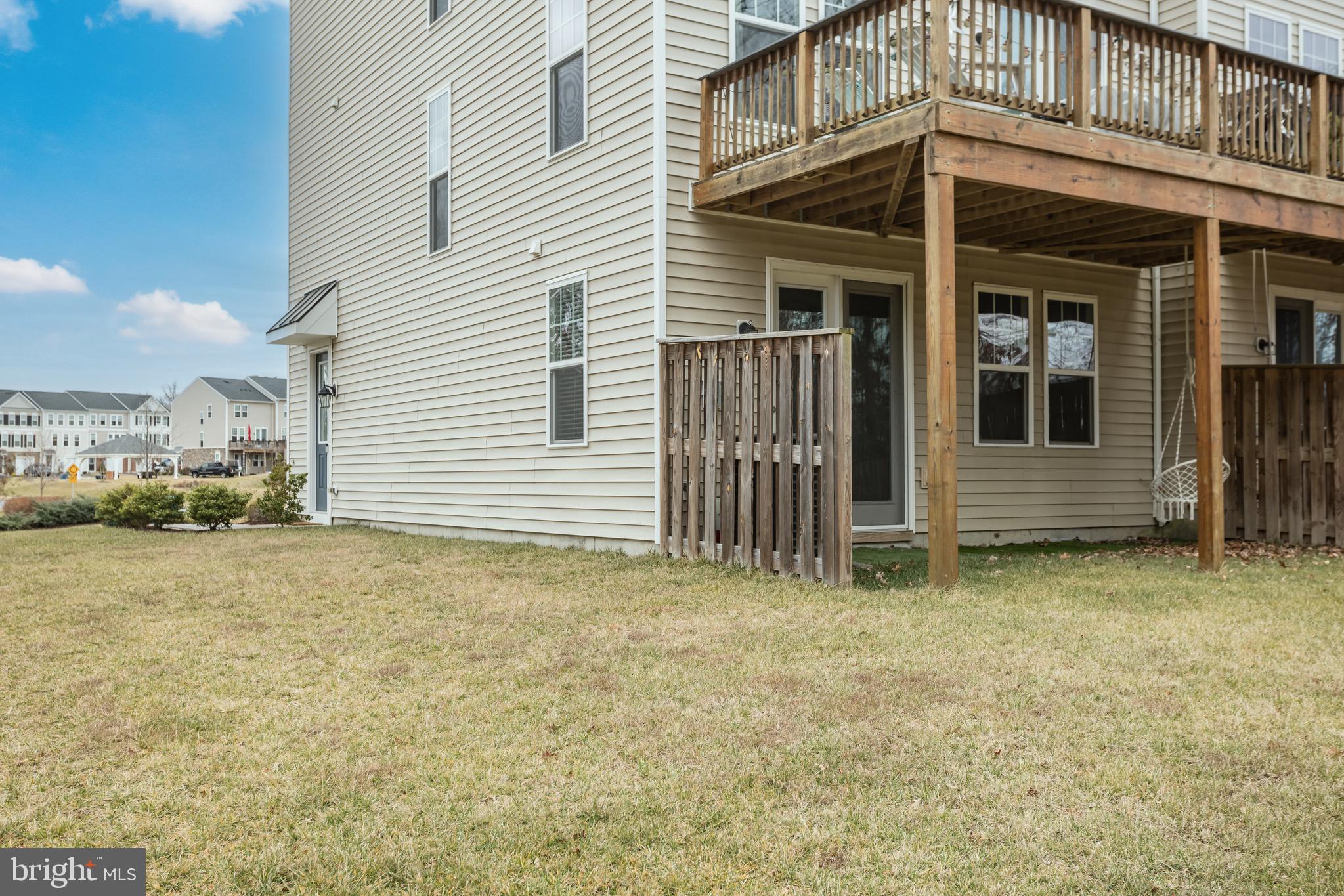 148 Solara Drive Winchester, VA 22602 - Photo 31 of 32 a view of a house with a backyard