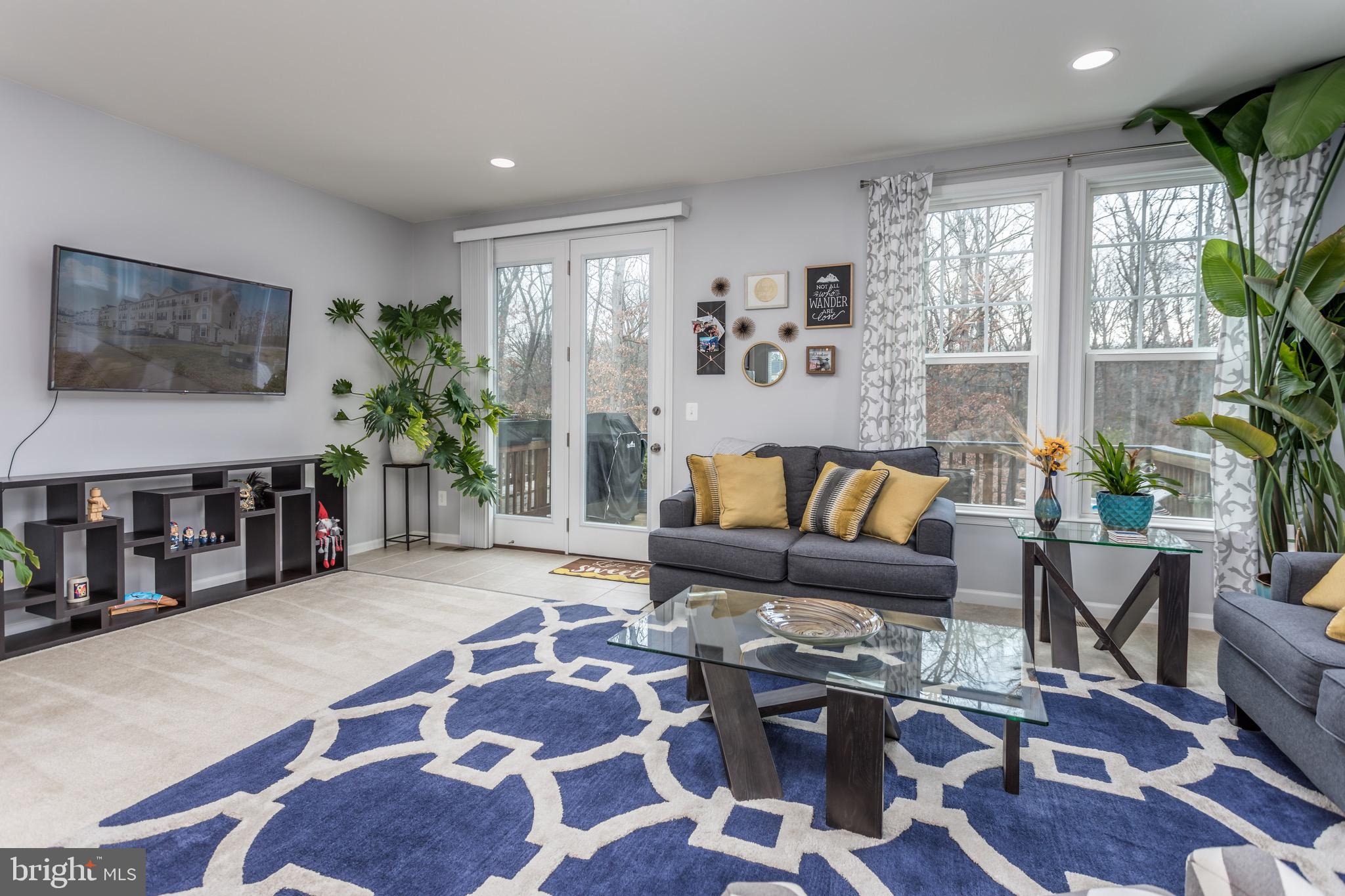 148 Solara Drive Winchester, VA 22602 - Photo 6 of 32 a living room with furniture and wooden floor