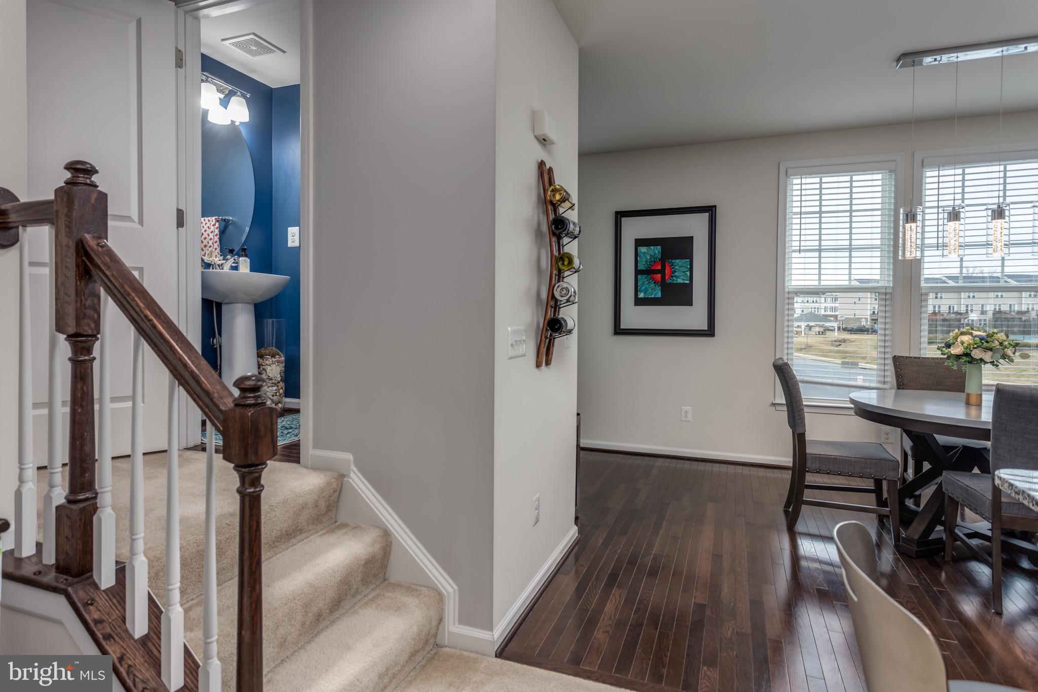 148 Solara Drive Winchester, VA 22602 - Photo 10 of 32 a view of a livingroom with furniture and hardwood floor