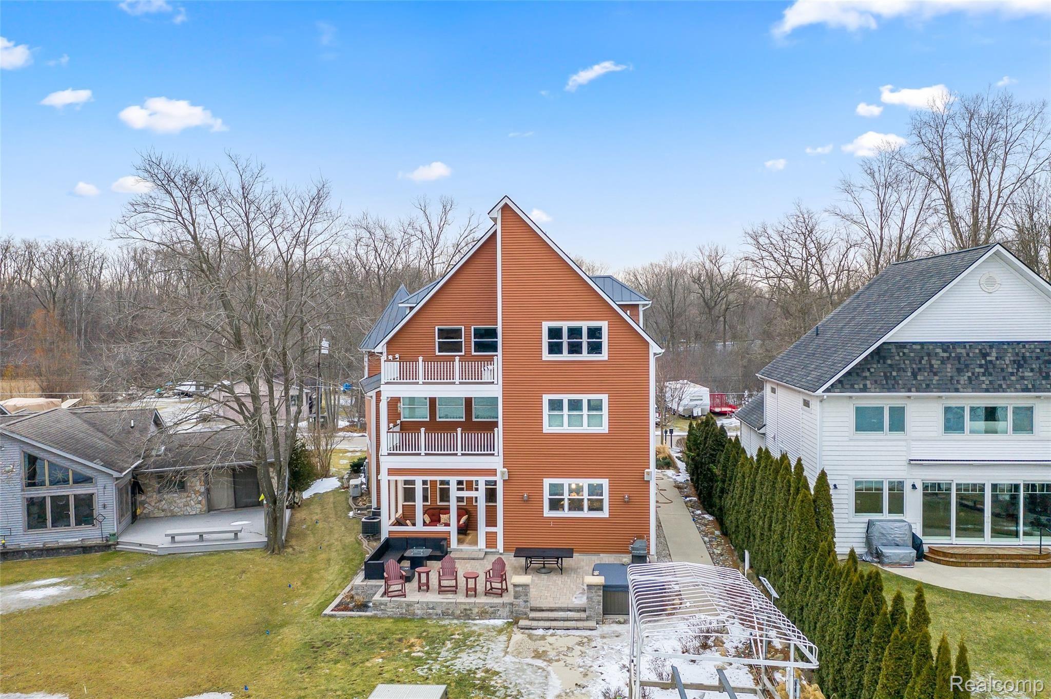 10136 Buhl Road Pinckney, MI 48169 - Photo 52 of 54 Three floors of beautiful views of strawberry lake!