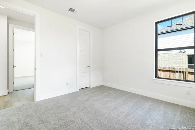 an empty room with a window