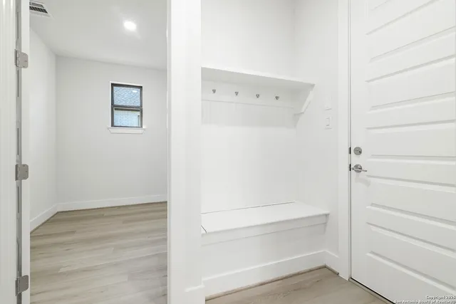 a view of an empty walk in closet
