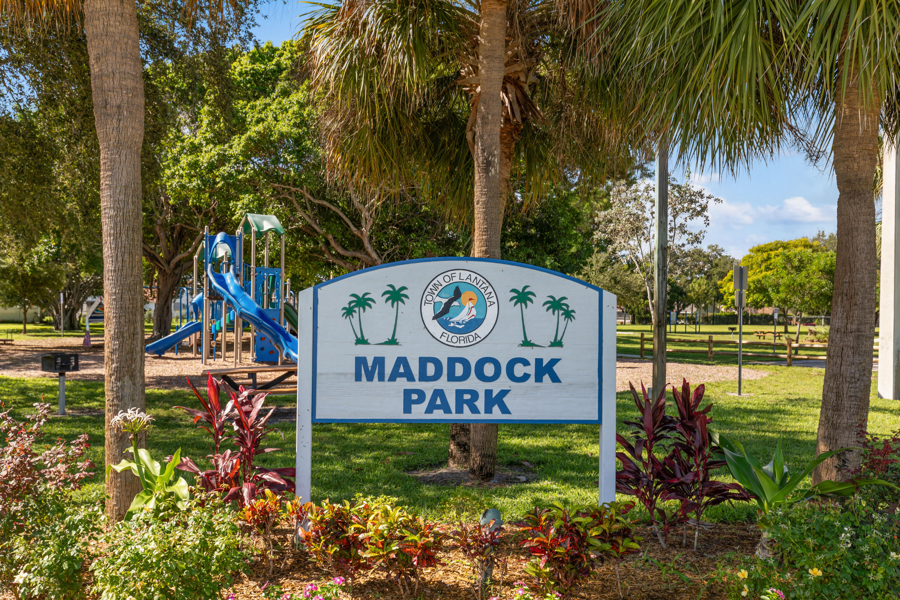 702 South 12th Street Lantana, FL 33462 - Photo 24 of 26 a sign on the side of the road