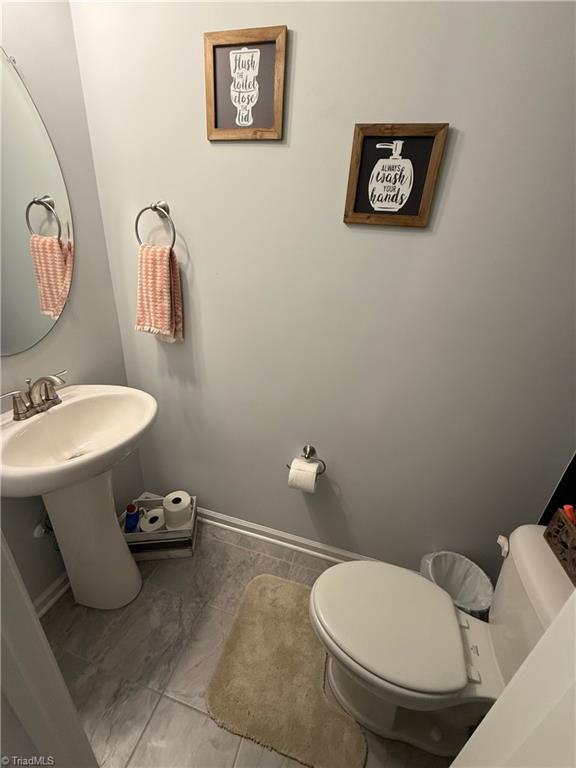 160 Tilly Road Madison, NC 27025 - Photo 19 of 21 half bath downstairs