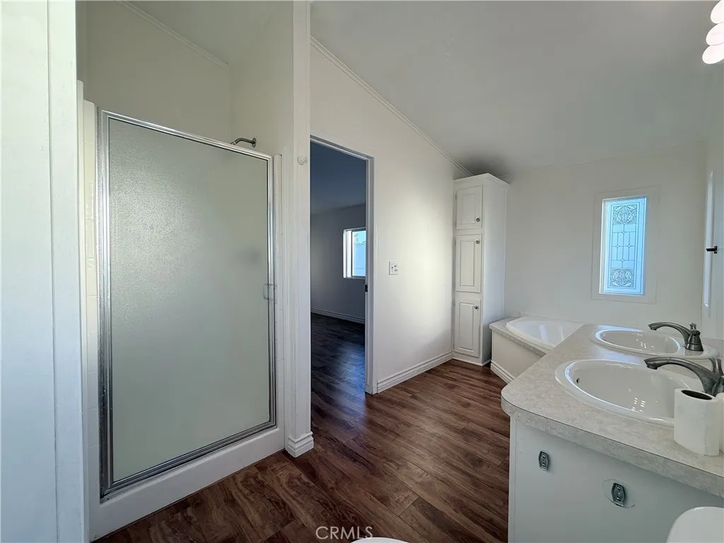 1051 Site, Unit 255 Brea, CA 92821 - Photo 16 of 30 a bathroom with a sink and mirror