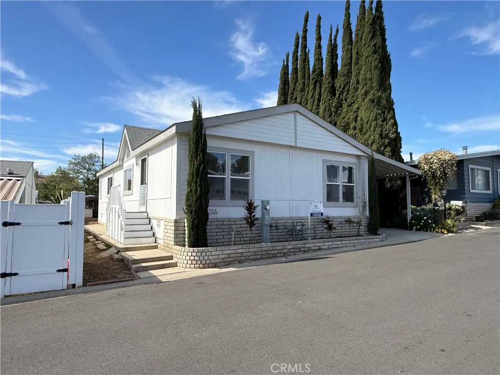 1051 Site, Unit 255 Brea, CA 92821 - Photo 2 of 30 a view of a house with a patio