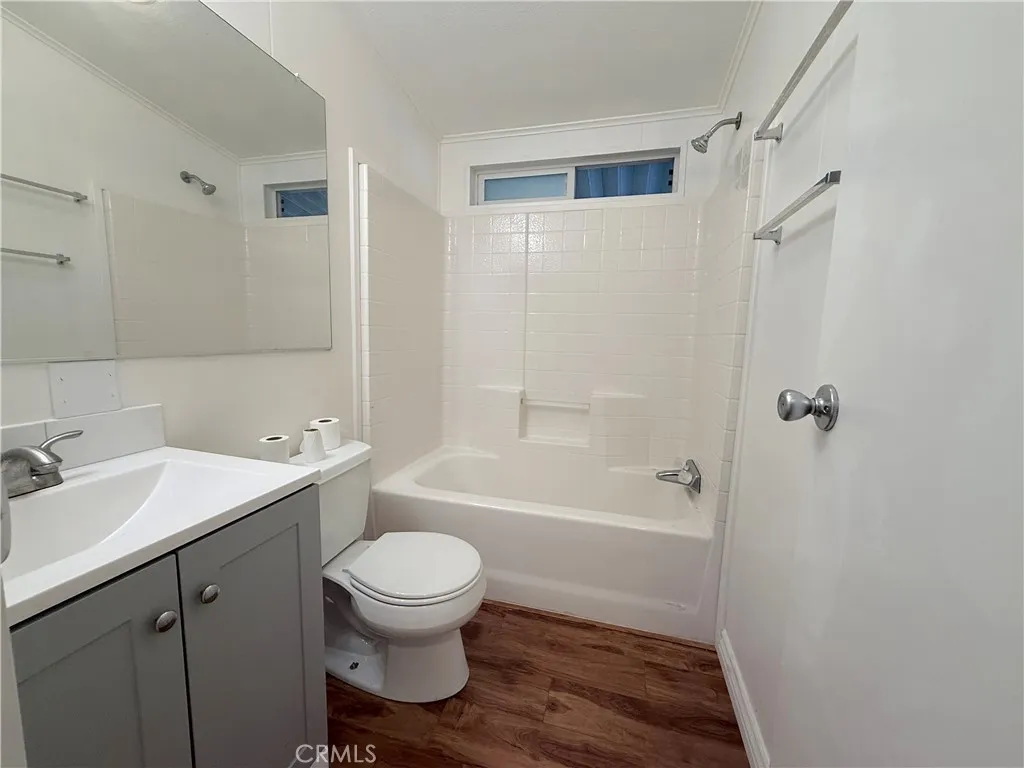 1051 Site, Unit 255 Brea, CA 92821 - Photo 21 of 30 a bathroom with a sink a toilet and shower