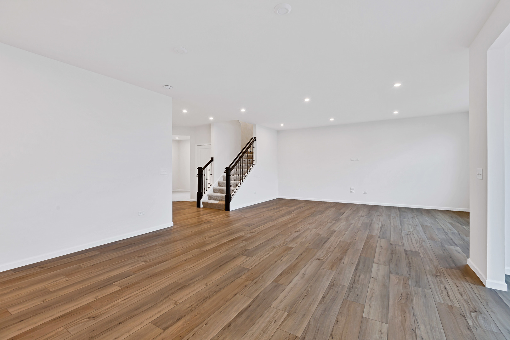 2120 Schmitt Circle Algonquin, IL 60102 - Photo 11 of 24 a view of an empty room with wooden floor stairs