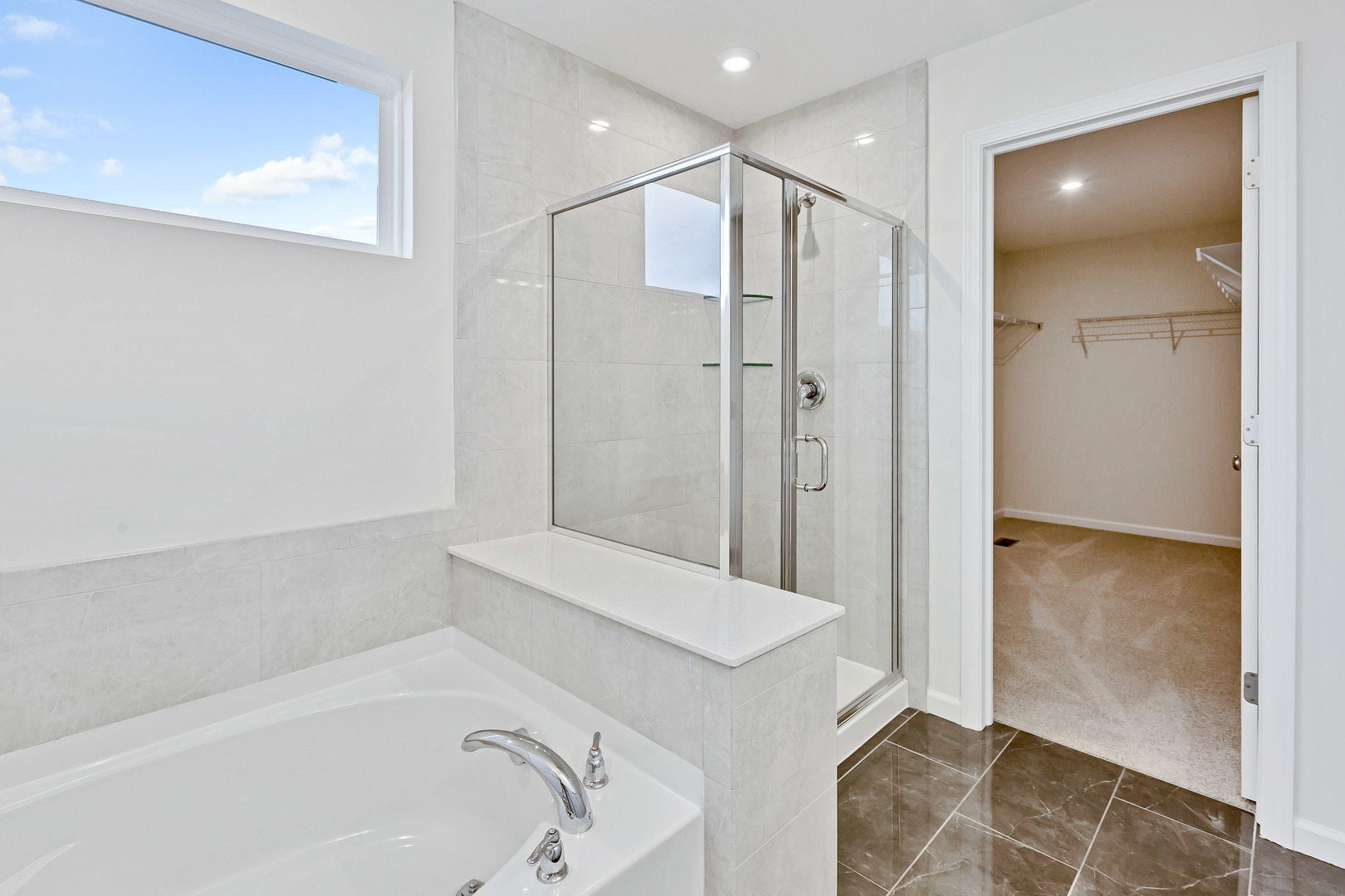 2120 Schmitt Circle Algonquin, IL 60102 - Photo 22 of 24 a bathroom with a bathtub and a shower