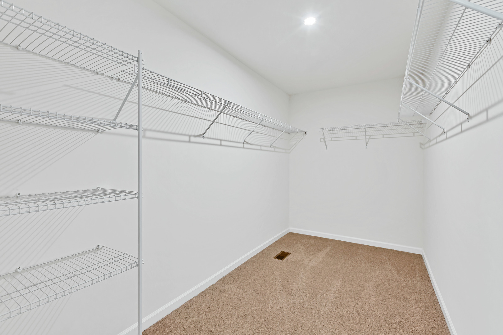 2120 Schmitt Circle Algonquin, IL 60102 - Photo 24 of 24 a view of a room with racks on the wall