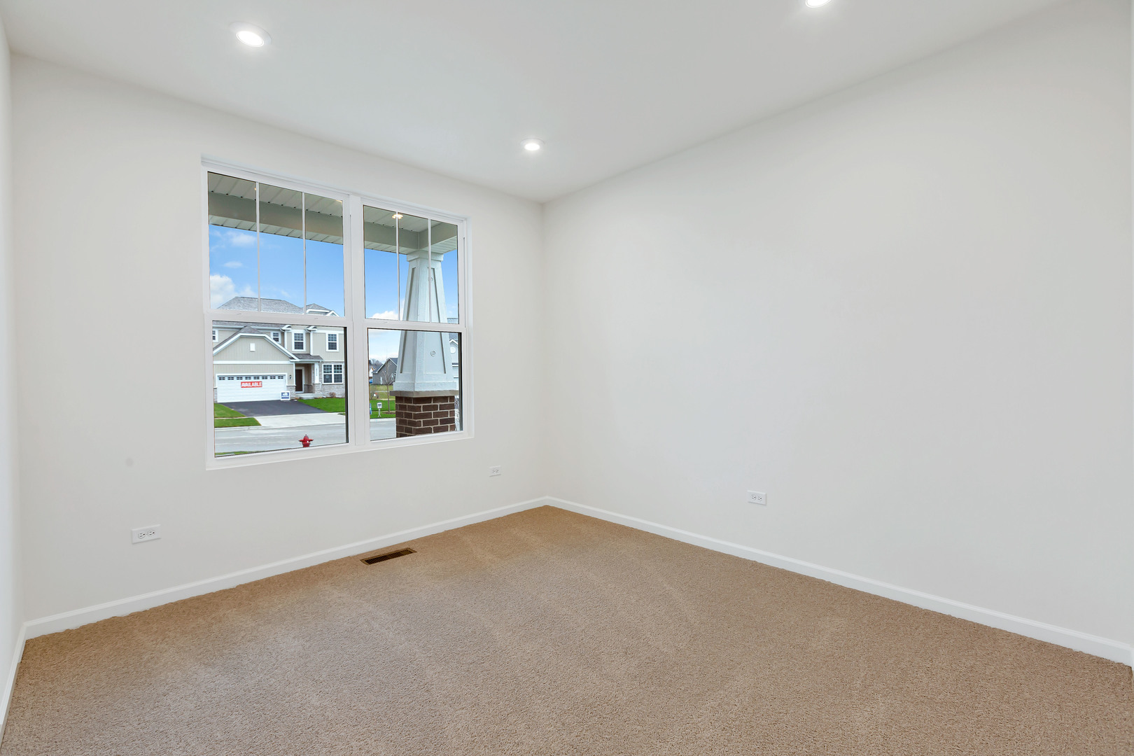 2120 Schmitt Circle Algonquin, IL 60102 - Photo 4 of 24 a view of an empty room with a window
