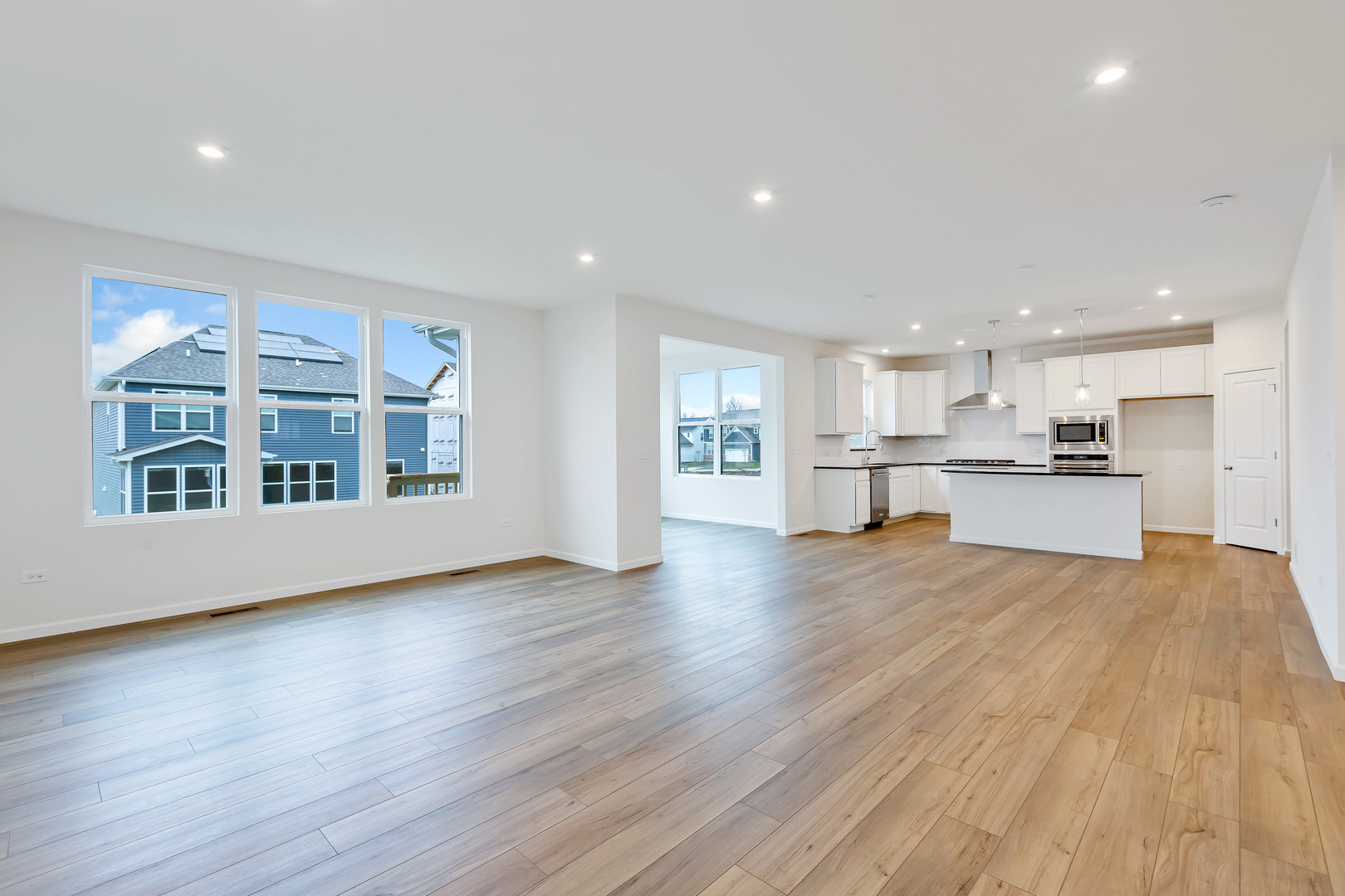 2120 Schmitt Circle Algonquin, IL 60102 - Photo 6 of 24 a view of large kitchen with a sink and wooden floor