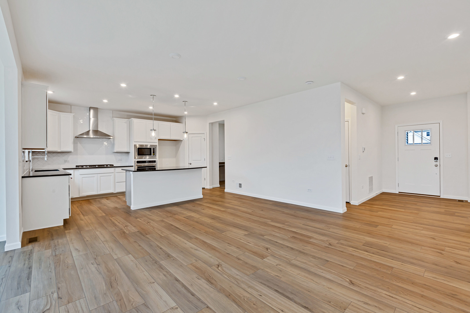 2120 Schmitt Circle Algonquin, IL 60102 - Photo 8 of 24 a view of kitchen with wooden floor