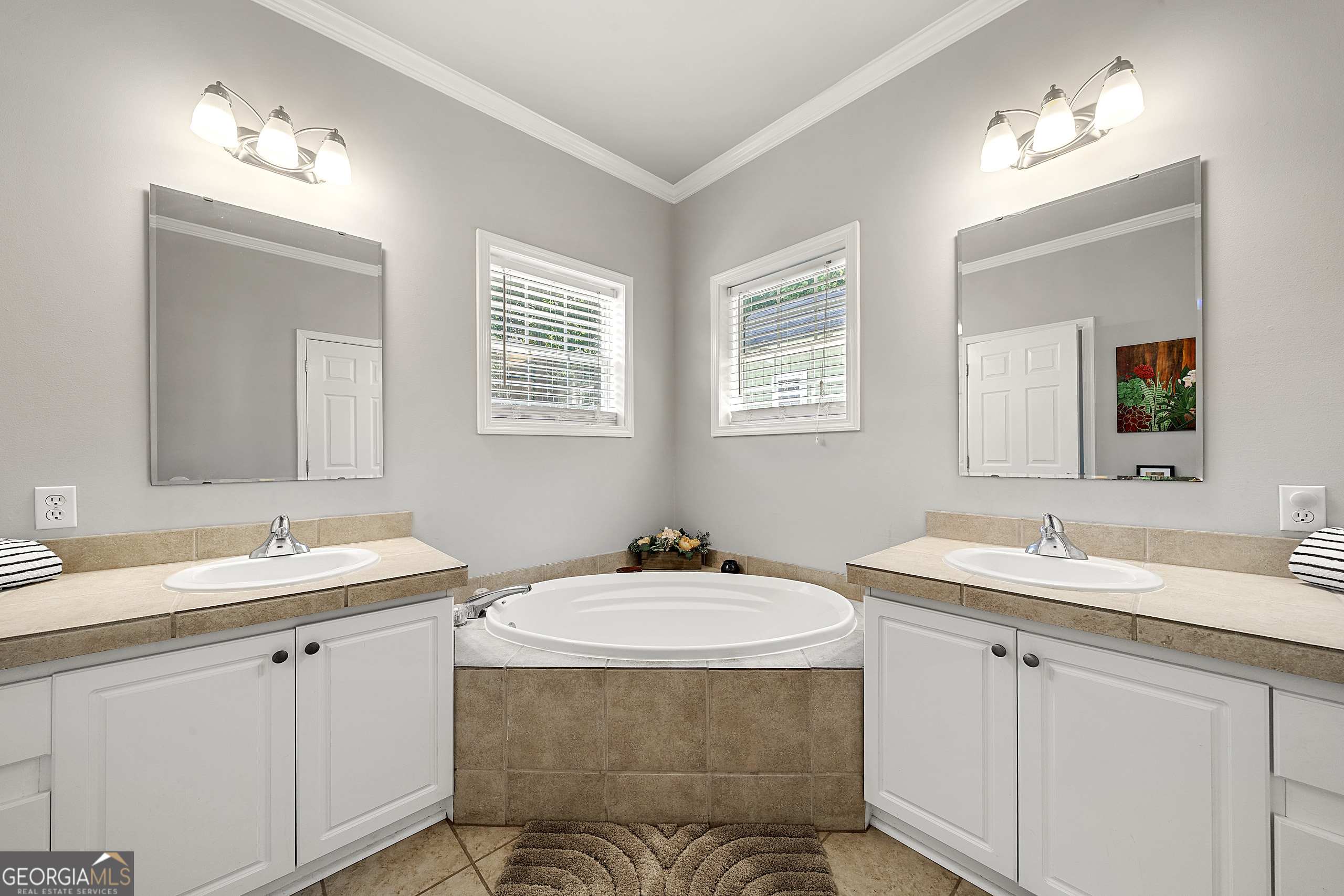 400 Sapling Court Temple, GA 30179 - Photo 28 of 55 a bathroom with double sink and a mirror