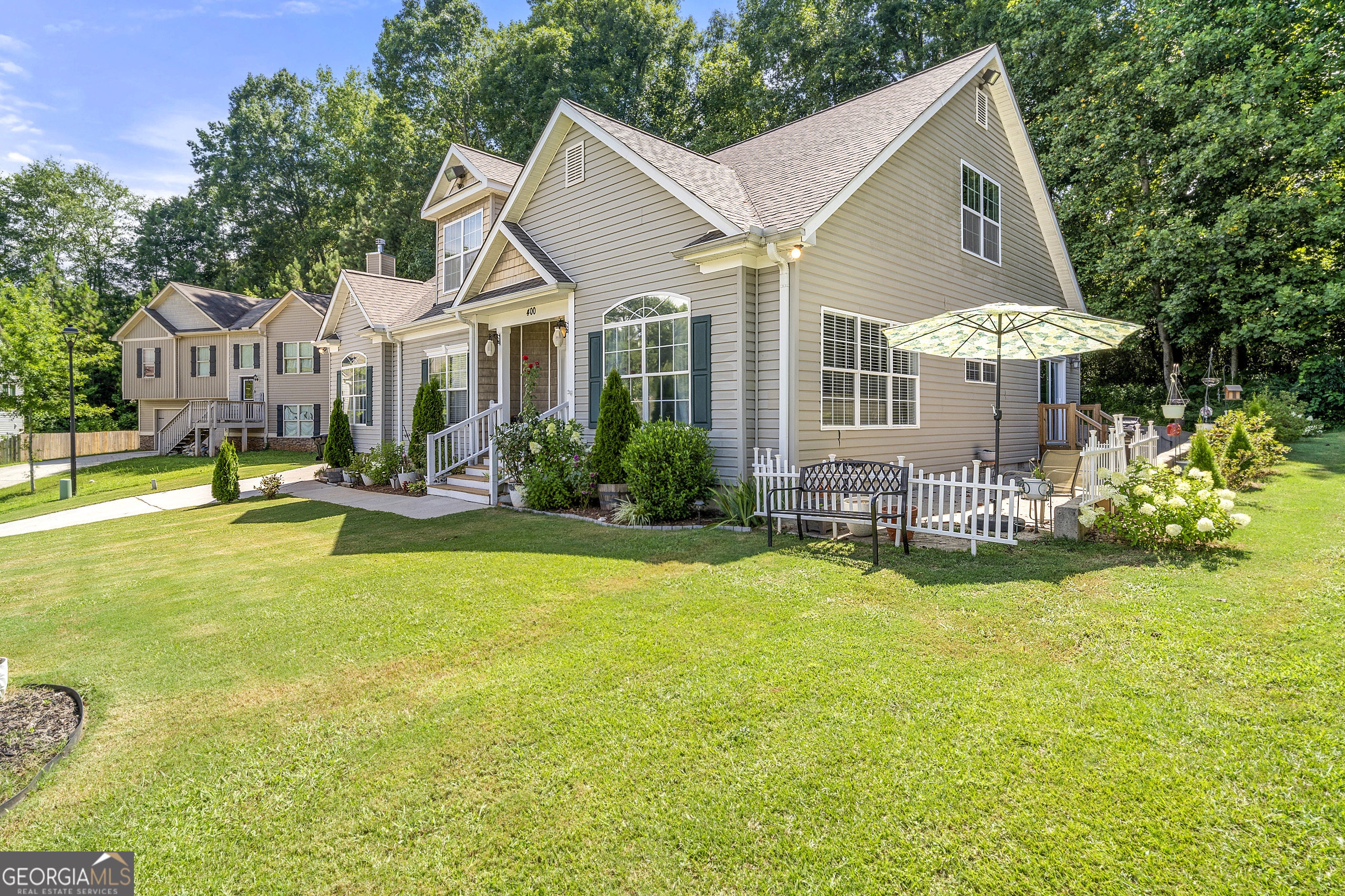 400 Sapling Court Temple, GA 30179 - Photo 3 of 55 a view of a house with swimming pool and a yard