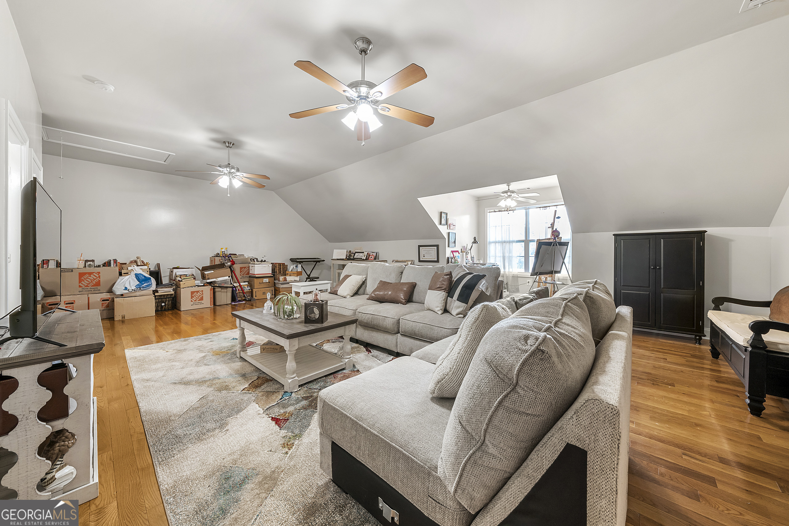 400 Sapling Court Temple, GA 30179 - Photo 34 of 55 a living room with furniture and a flat screen tv