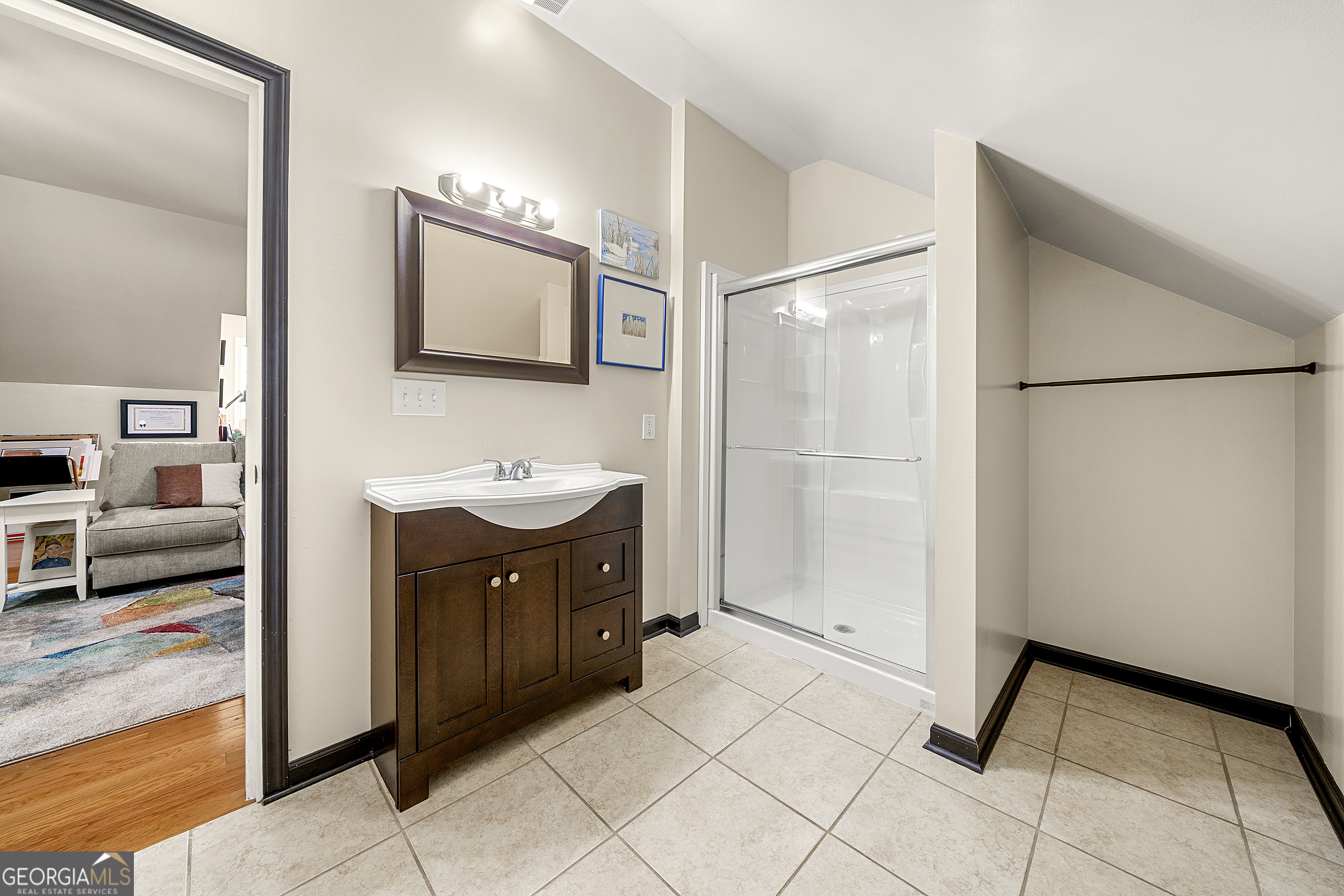 400 Sapling Court Temple, GA 30179 - Photo 36 of 55 a bathroom with a sink a mirror and a shower