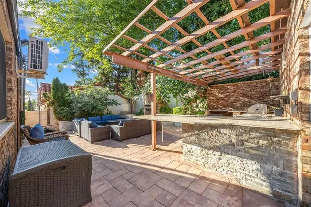 a view of swimming pool with a patio