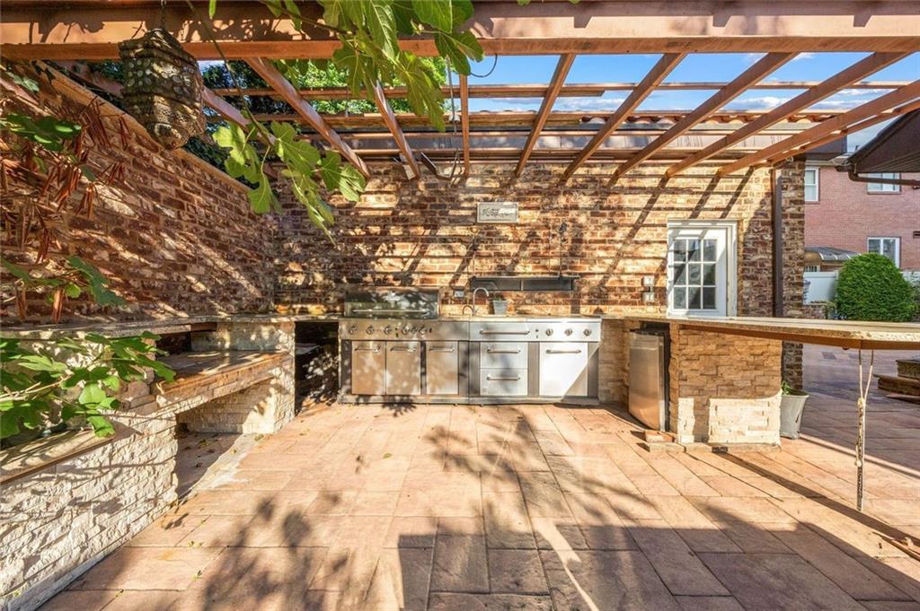 139 86th Street Brooklyn, NY 11209 - Photo 20 of 34 a view of a swimming pool with a patio