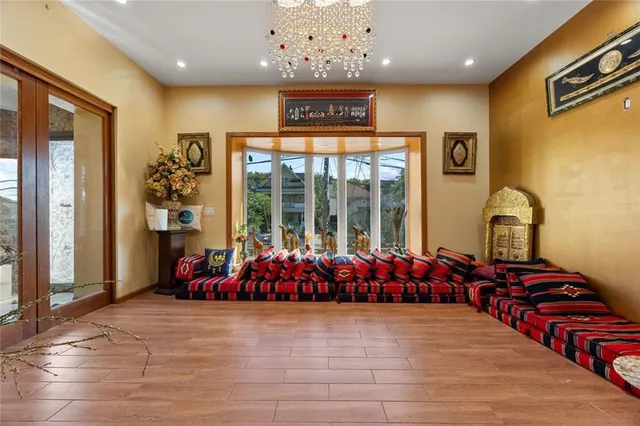 a bed room with bed and window