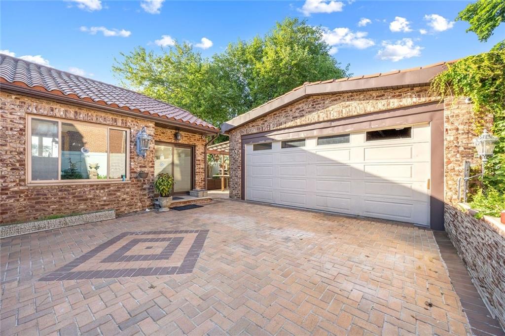 139 86th Street Brooklyn, NY 11209 - Photo 21 of 34 a view of backyard with a patio and a garden