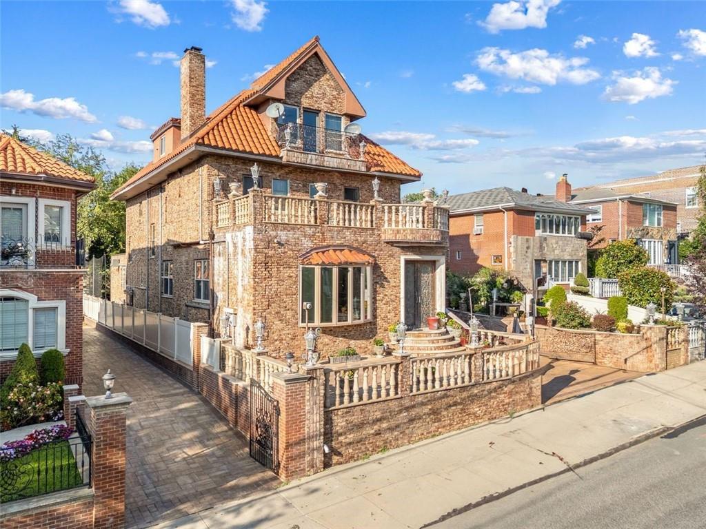 139 86th Street Brooklyn, NY 11209 - Photo 25 of 34 a front view of a house with a yard