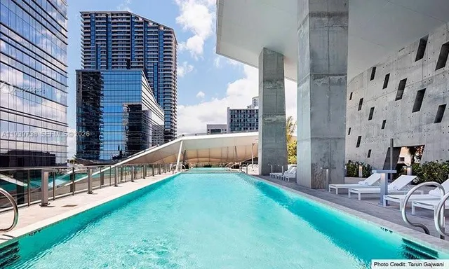 swimming pool with outdoor seating