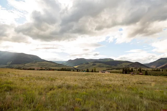 a view of a lake and mountain in the back
