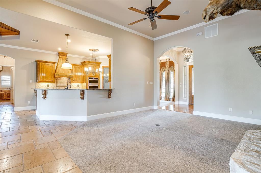 9549 Dickson Road Fort Worth, TX 76179 - Photo 14 of 40 a view of a kitchen with furniture and a kitchen view
