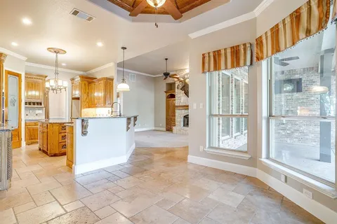 a view of a bathroom with a glass door shower