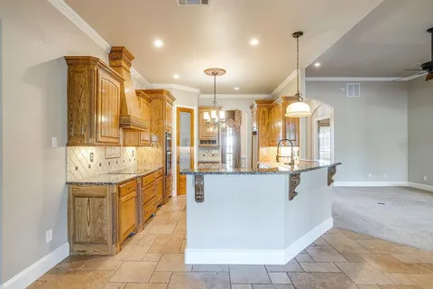 a large bathroom with a large tub sink shower and mirror